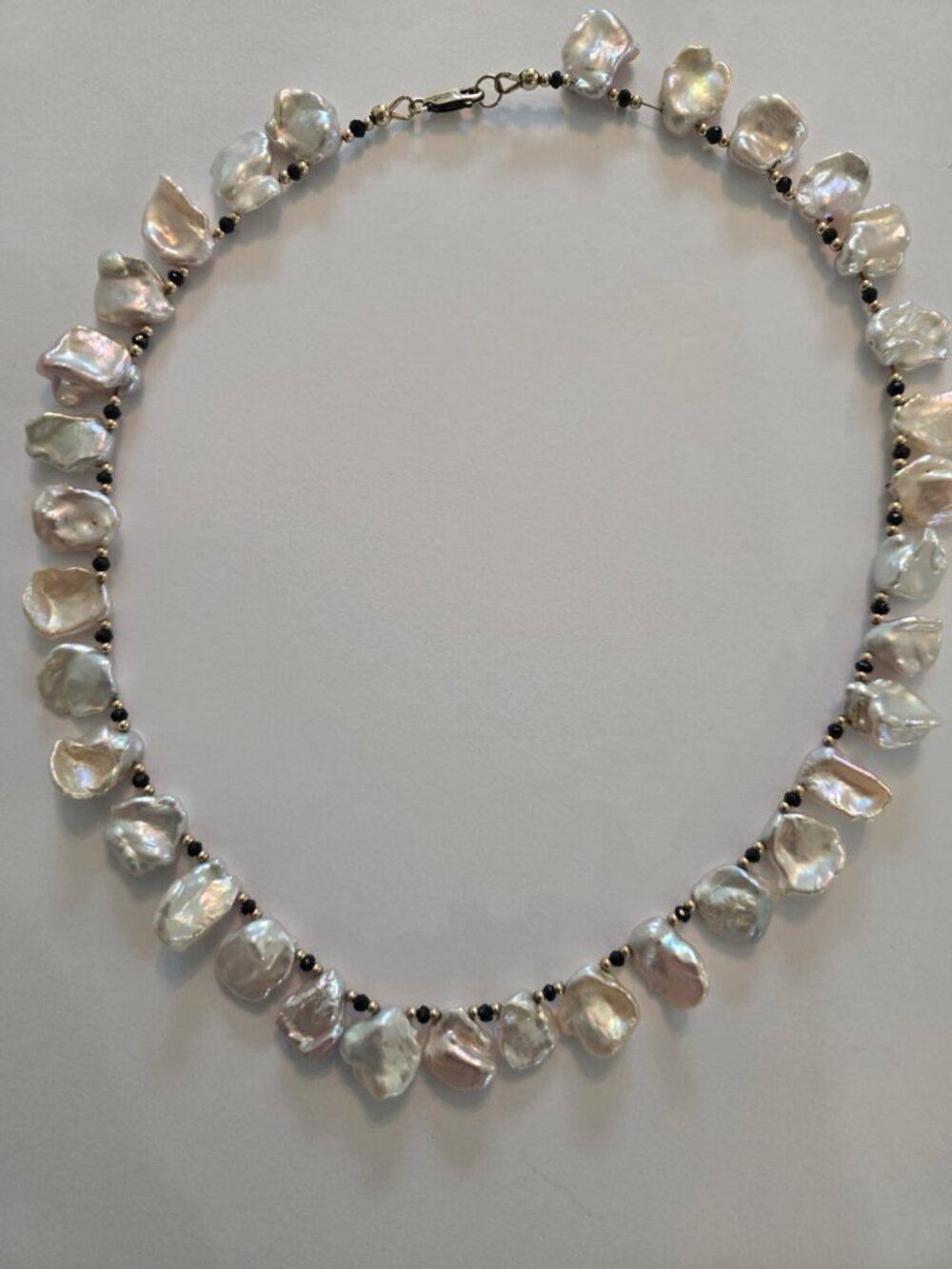 Gorgeous Keshi pearl necklace with black onyx and gold beads.